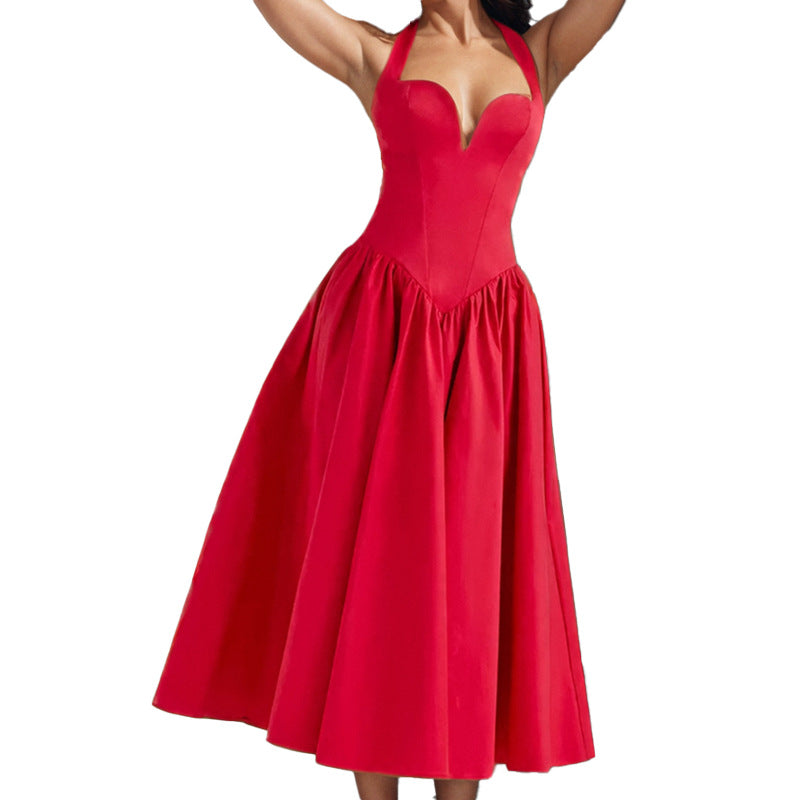 Halter neck backless maxi dress with a flared skirt