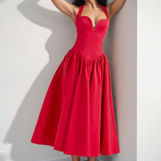 Halter neck backless maxi dress with a flared skirt